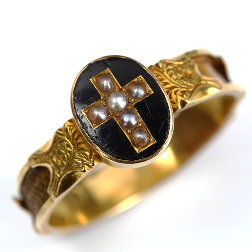 194 - A Victorian 15ct gold split pearl and black enamel cross memorial ring, with engraved floral shoulde... 