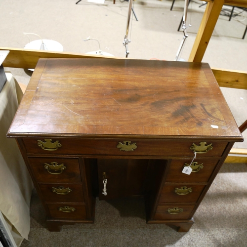 1425 - A George III mahogany kneehole desk of small size, with drawers and alcove cupboard, width 80cm, dep... 