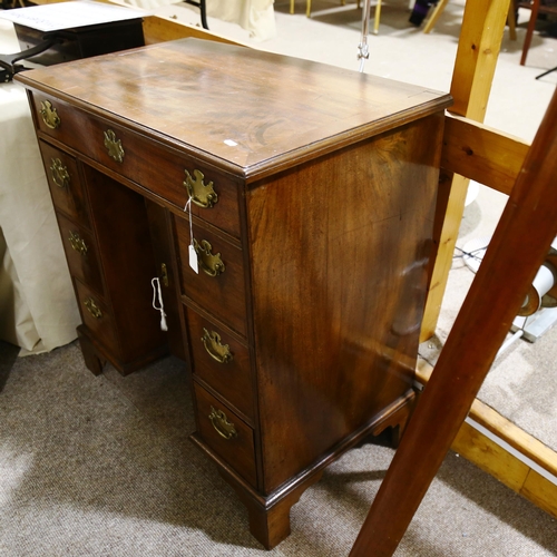 1425 - A George III mahogany kneehole desk of small size, with drawers and alcove cupboard, width 80cm, dep... 