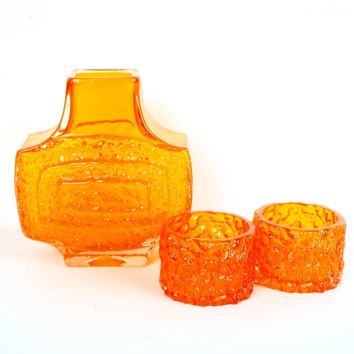 1800 - GEOFFREY BAXTER for Whitefriars Glass, a Tangerine TV textured vase and two Tangerine candle holders... 