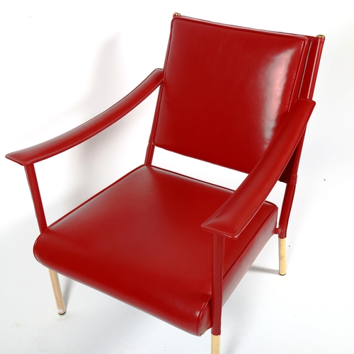 1816 - SOANE BRITAIN, a red leather Crillon lounge chair on brass legs in the manner of Jacques Adnet, heig... 