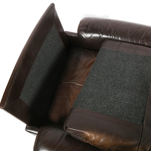 1818 - A 1970s' De Sede DS 31 lounge swivel chair, in brown leather, with aluminium base, height 75cm.