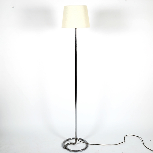 1858 - A 1930s' modernist tubular steel standard floor lamp with coiled base, height 160cm