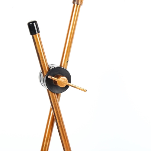 1866 - A mid-century copper desk lamp, with articulated stem, on cast iron base, height 47cm