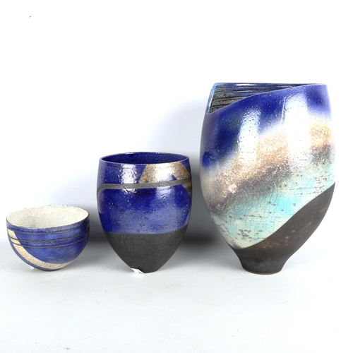 1888 - DAVID HOWARD JONES, a large studio pottery raku blue glaze vase and two similar vessels by the same ... 