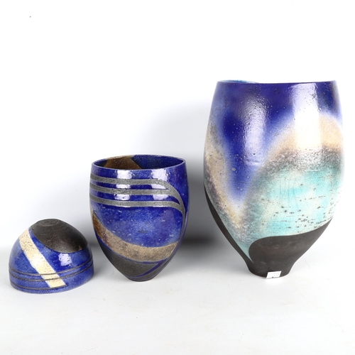 1888 - DAVID HOWARD JONES, a large studio pottery raku blue glaze vase and two similar vessels by the same ... 