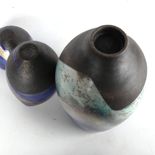 1888 - DAVID HOWARD JONES, a large studio pottery raku blue glaze vase and two similar vessels by the same ... 