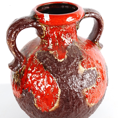 1918 - A large DUMLER & BRIEDEN, West German two handled vase, marked to base 1109/40 Germany, height 40cm