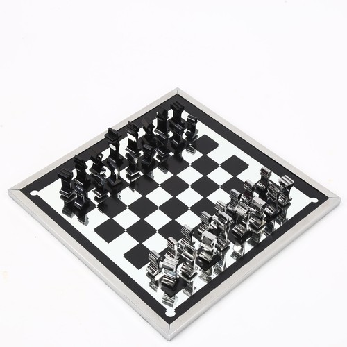 1854 - A 1960s' modernist chess set by ALCAN, France, aluminium pieces with aluminium framed mirror board, ... 