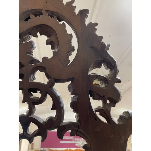 1413 - A 19th century mahogany display easel, with carved acanthus leaf decoration, height 2m