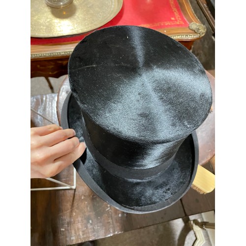 1264 - MANDER & ALLENDERS - a Vintage black silk top hat, in a Victorian brown leather hatbox