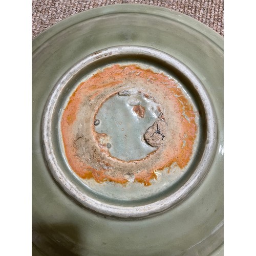 1008 - A Chinese celadon glaze bowl with relief moulded decoration, diameter 30cm