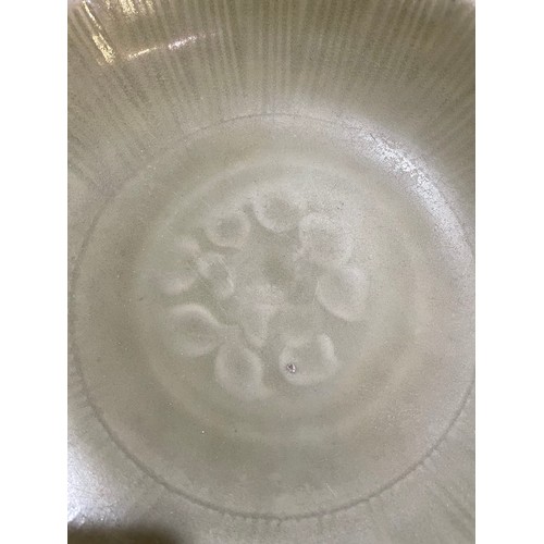 1008 - A Chinese celadon glaze bowl with relief moulded decoration, diameter 30cm