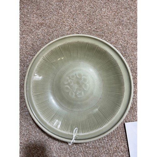 1008 - A Chinese celadon glaze bowl with relief moulded decoration, diameter 30cm