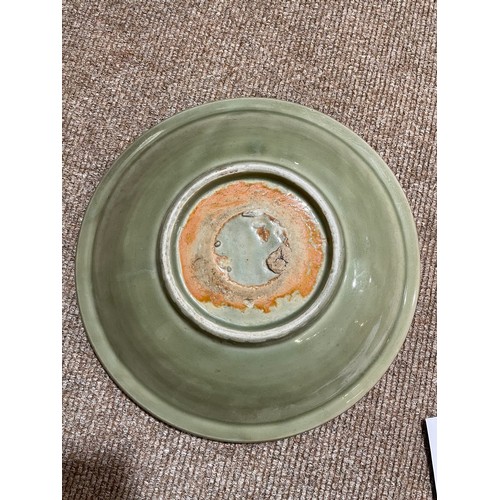 1008 - A Chinese celadon glaze bowl with relief moulded decoration, diameter 30cm