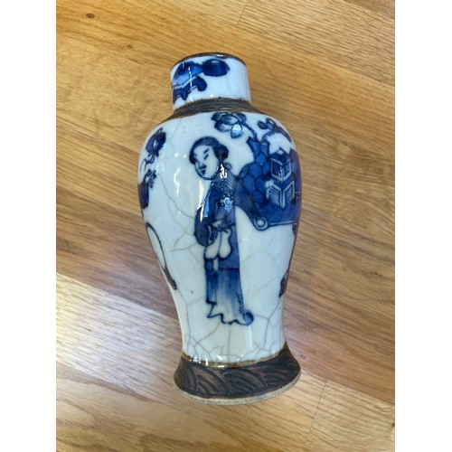 1291 - A pair of Chinese blue and white crackle glaze vases, height 16.5cm