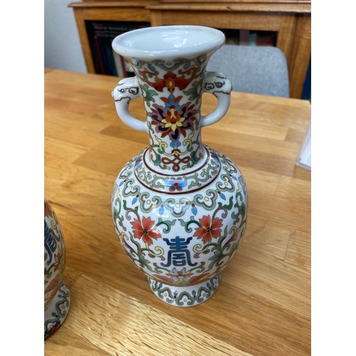 1446 - A pair of Chinese white ground cloisonne enamel vases, detailed multi-colour decoration, height 22cm... 