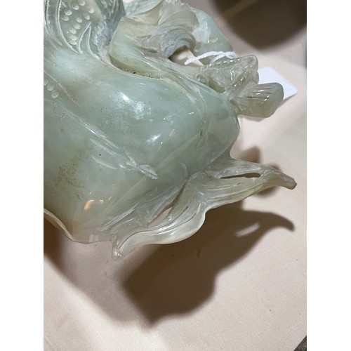 1313 - A large Chinese carved jade cabbage, length 27cm, and a carved stone dog with puppy, length 14cm (2)