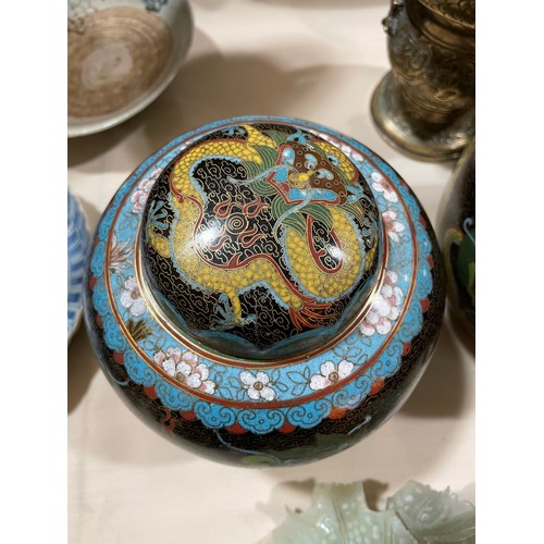 1540 - A pair of Chinese cloisonne enamel jars and covers, with dragon designs, height 18cm