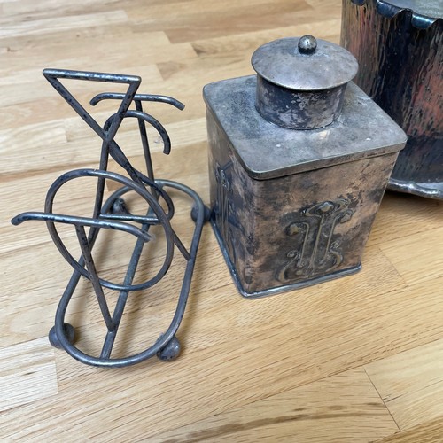 1410 - An Art Nouveau square-section electroplate tea caddy, height 13cm, a plated toast rack, and a Victor... 