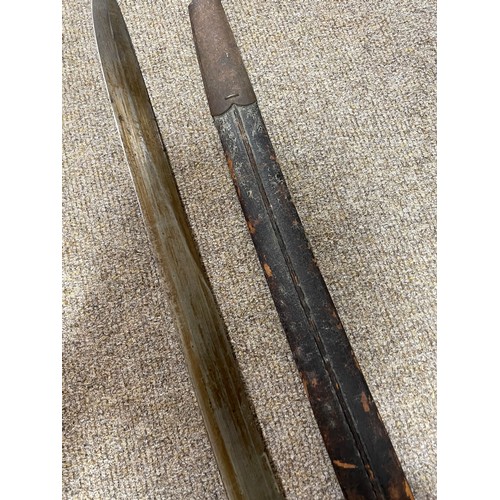 1186 - A 19th century long French sword bayonet, with bowl hilt, maker's marks A and EH, original leather a... 