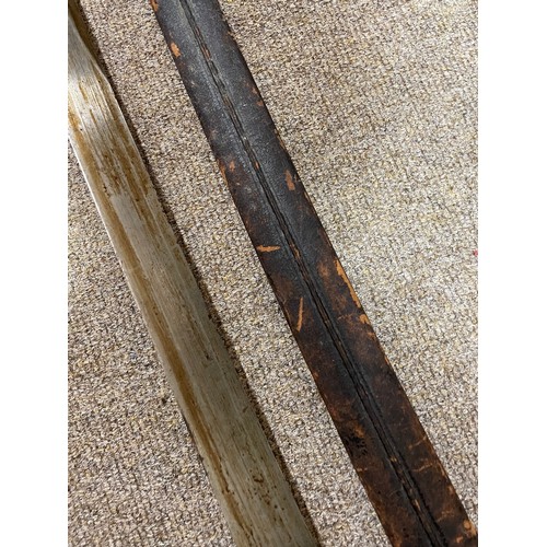 1186 - A 19th century long French sword bayonet, with bowl hilt, maker's marks A and EH, original leather a... 