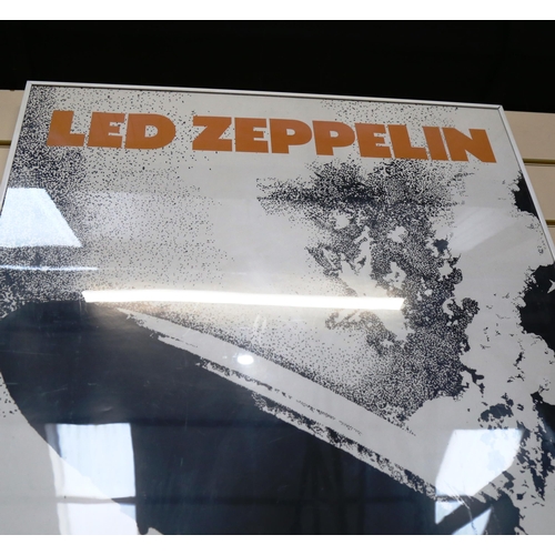 114 - A reprinted Led Zeppelin poster, framed, overall 85cm x 60cm