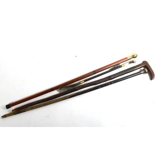 116 - A group of walking sticks and canes, including silver-topped example (4)