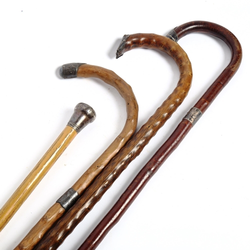 120 - 4 Vintage walking sticks and canes with silver mounts