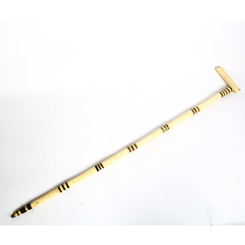 121 - A Vintage bone and horn sectional walking stick, length 92cm