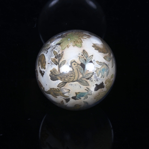 131 - An Antique reverse printed glass orb, depicting flora and fauna, including emu, squirrel etc, diamet... 