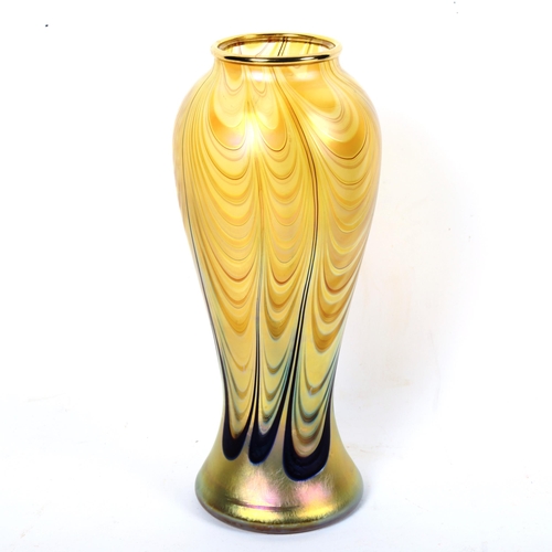 164 - An Okra iridescent Art glass vase, signed on base, height 24cm, boxed