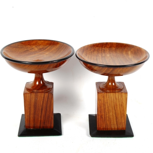 167 - A pair of reproduction turned wood tazza, height 18cm