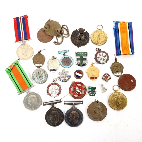 187 - Various First and Second World War medals and badges, including pair and dog tags to 100534 Spr W He... 