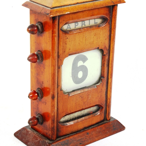 190 - A Vintage oak perpetual desk calendar, height 21cm