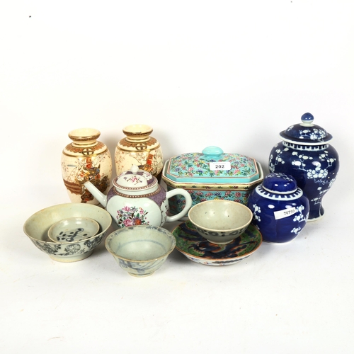 202 - Various Oriental ceramics, including blue glaze pottery vase, export teapot, blue and white Prunus p... 