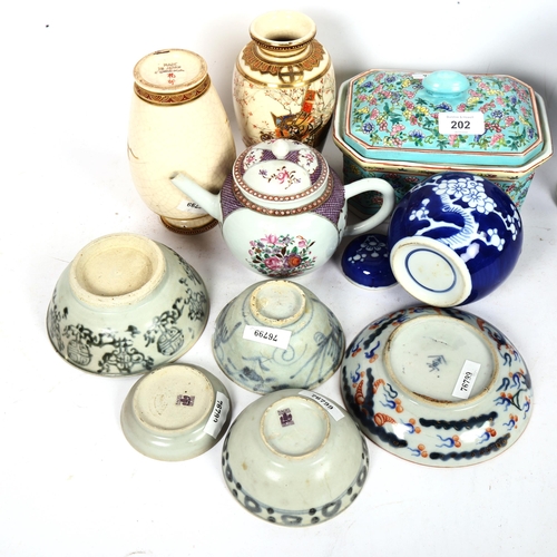 202 - Various Oriental ceramics, including blue glaze pottery vase, export teapot, blue and white Prunus p... 