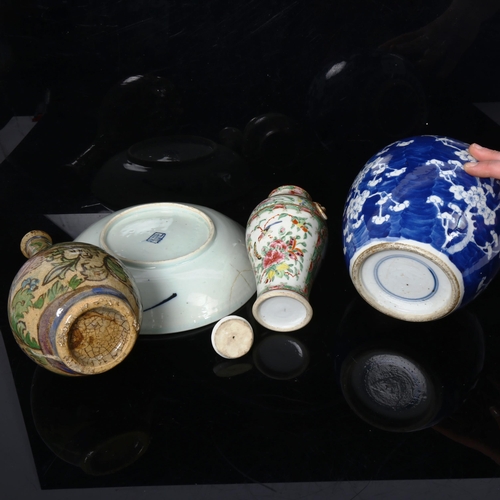 217 - A Chinese blue and white Prunus pattern ginger jar, Canton famille rose vase, crab plate, and an Ira... 