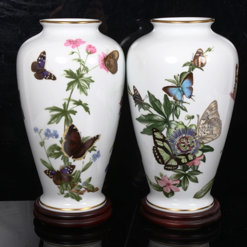 225 - A pair of Franklin porcelain limited edition vases, by John Wilkinson, including the Caribbean Butte... 