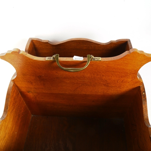 263 - A large light oak bottle carrier, with brass handle, W40cm, H37cm, D45cm