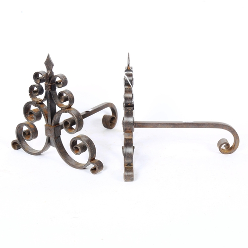 264 - A pair of wrought-iron scroll andirons, height 24cm