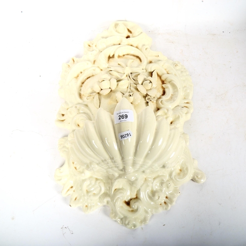 269 - A large Spanish ivory pottery wall sconce, height 52cm