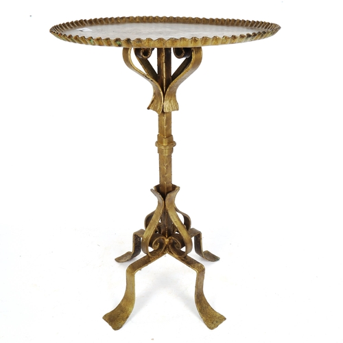 299 - A gold painted wrought-iron wine table, with piecrust edge, diameter 40cm, height 61cm