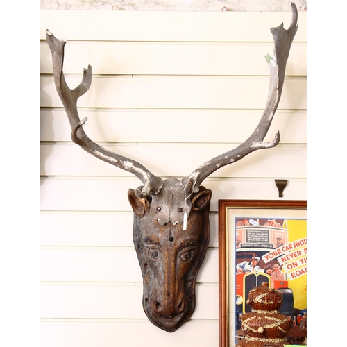 65 - A Folk Art pine deer's head with antlers, overall height 85cm