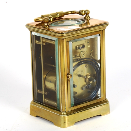 87 - A brass-cased carriage clock, with movement striking on a gong, case height 12.5cm