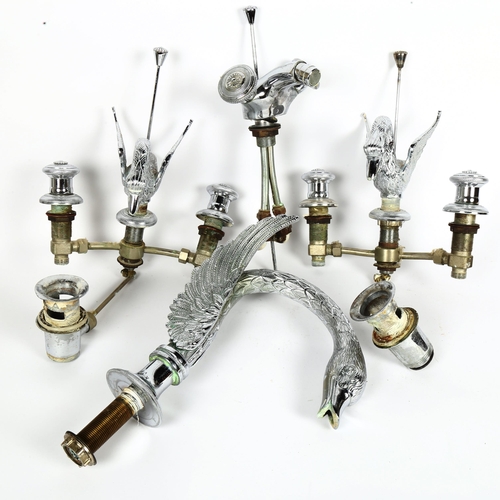 92 - A set of chrome plate swan bath taps