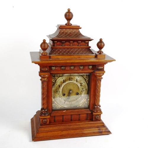 342 - A German oak-cased architectural 8-day mantel clock, case height 50cm