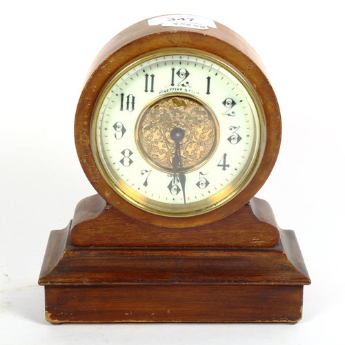 347 - A small walnut-cased drum mantel clock, by Benetfink & Co Ltd, height 17cm