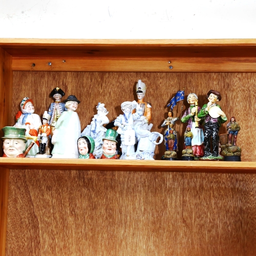 692 - A shelf of figures, Beswick character jugs etc