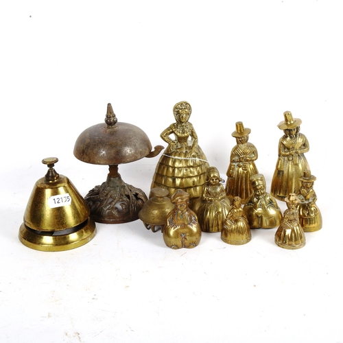 698 - A group of brass figure bells etc